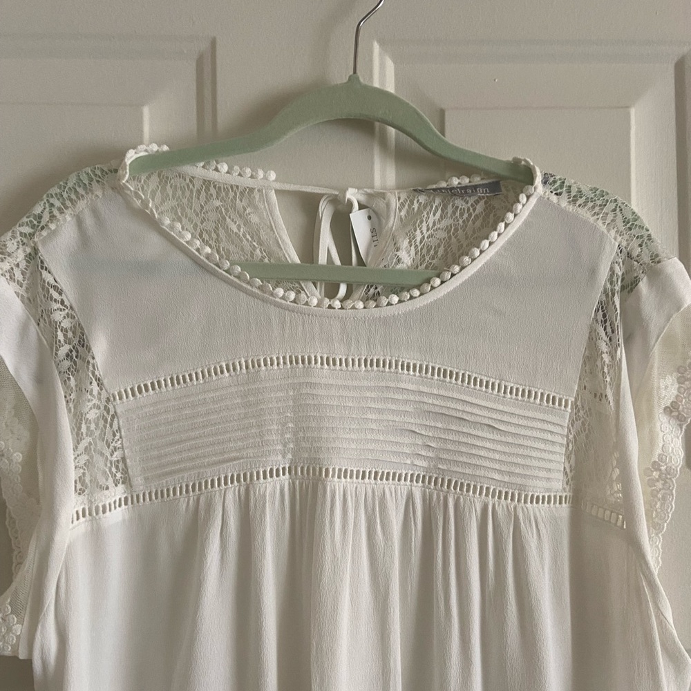 White top with lace accents